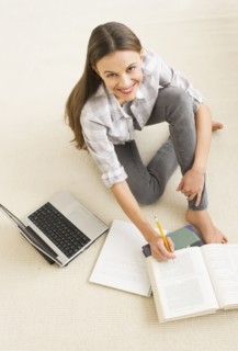 Woman studying at home.