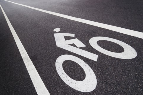 Sign on bike lane.