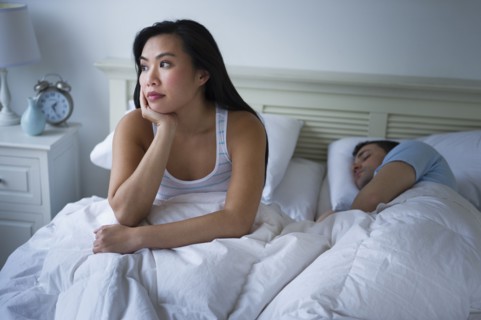 Couple in bed.