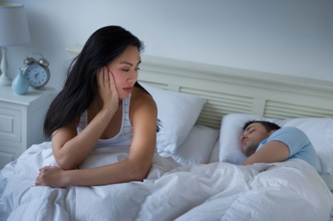 Couple in bed.
