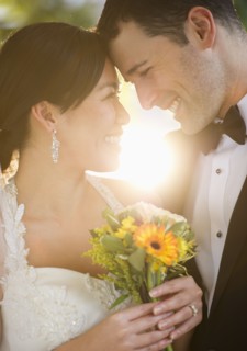 Bride and groom looking at each other.
