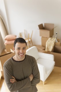 Portrait of man in new house.