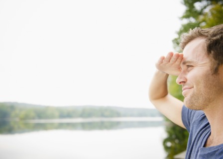 USA, New York, Putnam Valley, Roaring Brook Lake, Close up of man looking at view. Photo: Jamie