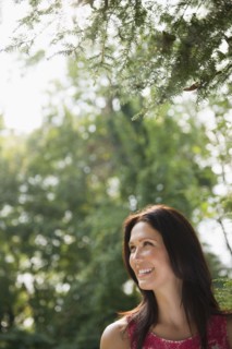 Roaring Brook Lake, Close up of woman in forest. Photo: Jamie Grill