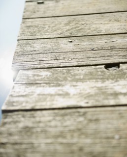 Roaring Brook Lake, Close up of wooden pier. Photo: Jamie Grill