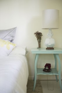 Roaring Brook Lake, Interior of rustic bedroom. Photo: Jamie Grill