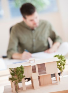 Portrait of architect working in office. Photo : Daniel Grill