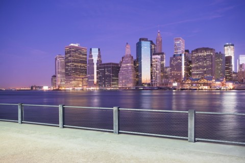 USA, New York State, New York City, City skyline at dusk. Photo: fotog
