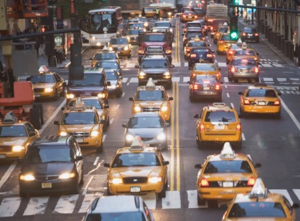 USA, New York City, Manhattan, Traffic stopped at zebra crossing on 42nd street. Photo : fotog
