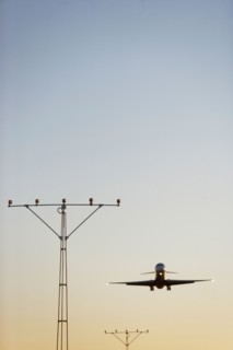 Commercial aeroplane taking off from runway. Photo : fotog