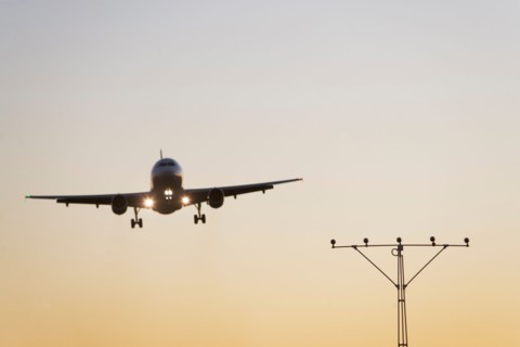 Commercial aeroplane taking off from runway. Photo : fotog