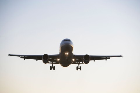 Commercial aeroplane taking off from runway. Photo : fotog
