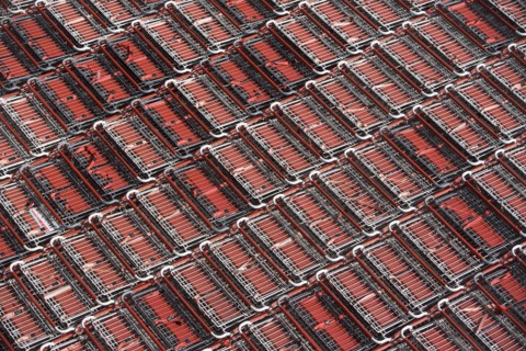 Full frame shot of supermarket trolleys. Photo : fotog