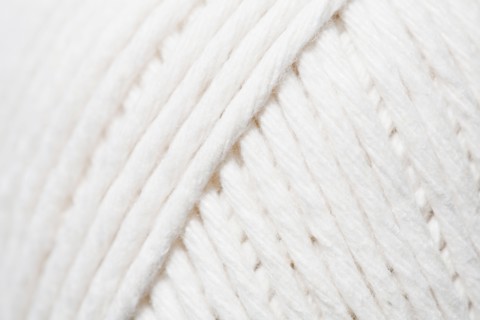 Close-up of ball of white yarn. Photo : Kristin Lee