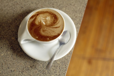 Cup of coffee on table. Photo : John Kelly