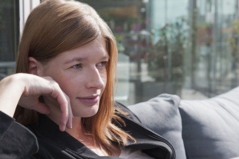 The Netherlands, Amsterdam, Portrait of young businesswoman. Photo: Jan Scherders