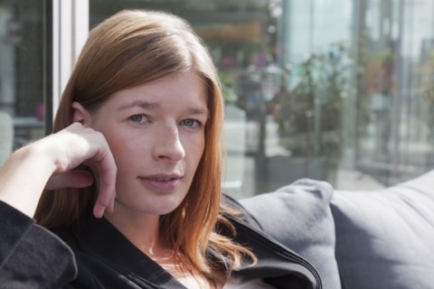 The Netherlands, Amsterdam, Portrait of young businesswoman. Photo: Jan Scherders