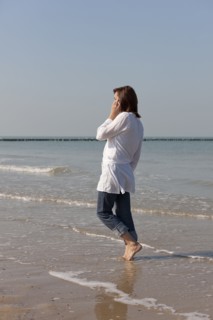 Woman on beach. Photo : Jan Scherders