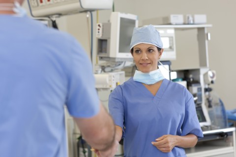 Surgeons in operating room. Photo : db2stock