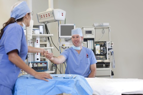 Surgeons in operating room. Photo : db2stock