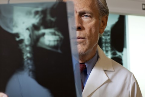 Doctor looking at x-ray. Photo : db2stock