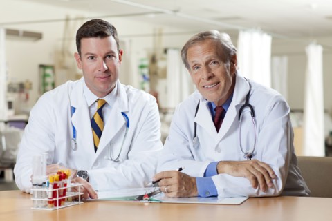 Portrait of two doctors in hospital. Photo : db2stock