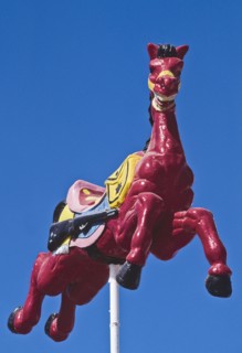 Mexico, Carousel painted horse used as building decor. Photo : DKAR Images