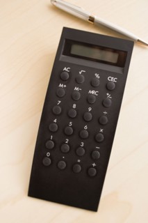Calculator on desk. Photo : Rob Lewine