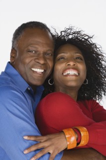 Studio portrait of mature couple. Photo : Rob Lewine