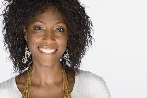 Studio portrait of mature woman. Photo : Rob Lewine