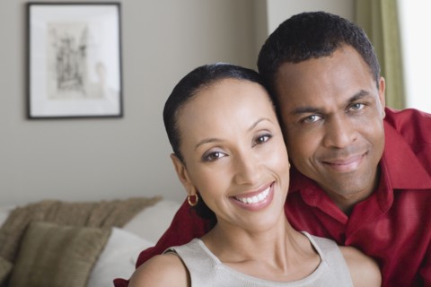 Portrait of couple at home. Photo : Rob Lewine
