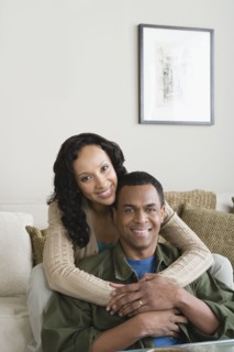Portrait of couple at home. Photo : Rob Lewine