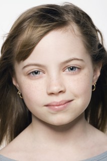 Studio portrait of girl (8-9), close up. Photo : Rob Lewine