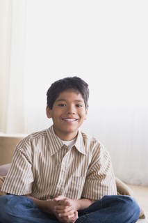 Portrait of smiling boy (10-11). Photo : Rob Lewine