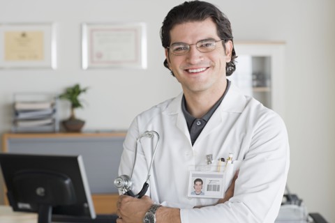 Portrait of smiling male doctor. Photo: Rob Lewine