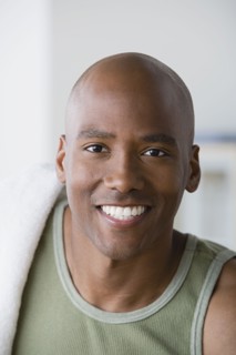 Portrait of athlete smiling. Photo : Rob Lewine