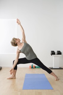 Woman in yoga pose. Photo : Rob Lewine