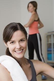 Two women exercising in gym. Photo : Rob Lewine