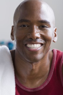 Portrait of male athlete smiling. Photo : Rob Lewine