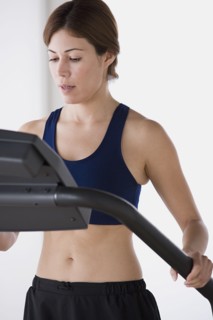 Woman training on treadmill. Photo: Rob Lewine