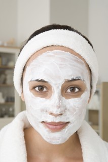 Portrait of woman with facial mask. Photo : Rob Lewine