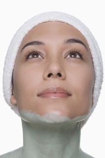Portrait of attractive woman enjoying spa treatment. Photo : Rob Lewine