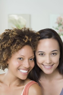Portrait of two attractive women. Photo : Rob Lewine