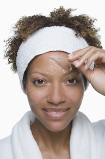 Portrait of attractive woman with facial mask. Photo : Rob Lewine