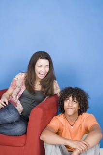 Portrait of teenage girl and boy (14-15, 16-17). Photo : Rob Lewine