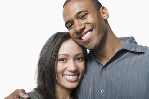 Studio portrait of young couple. Photo : Rob Lewine