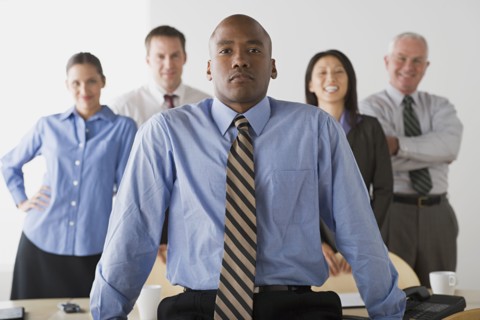 Portrait of business people in office. Photo : Rob Lewine