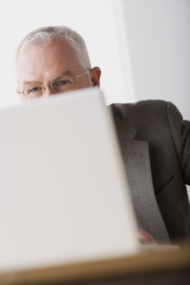 Portrait of mature businessman. Photo : Rob Lewine