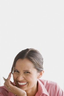 Portrait of happy businesswoman. Photo : Rob Lewine