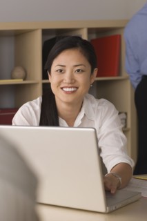 Portrait of businesswoman in office. Photo : Rob Lewine